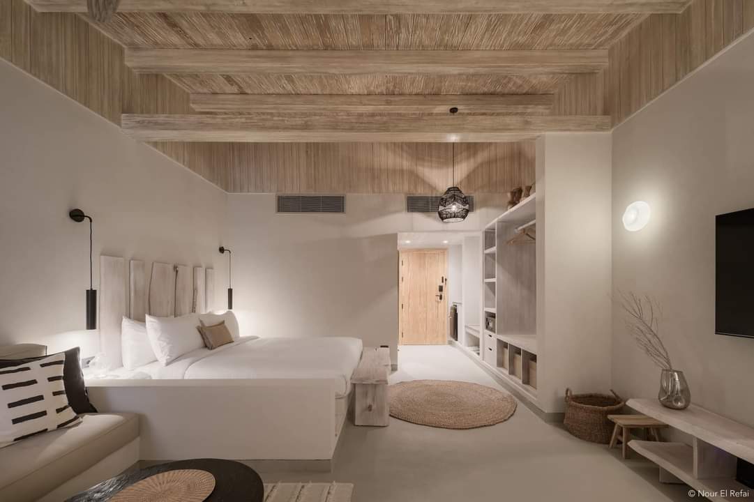 Interior entry composition featuring crafted wood elements